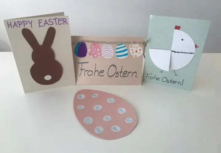 Drei selbstgebastelte Osterkarten mit Hasen, Küken und Ostereiern.