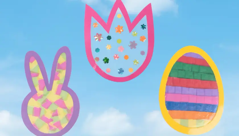 Bunte Osterdekorationen für Fenster: Hase, Tulpe und Ei, gebastelt mit Papier und Glitzer.