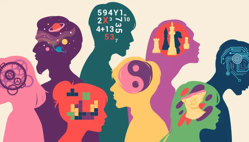 Bunte Silhouetten von Köpfen, die unterschiedliche Denkweisen zeigen: Universum, Zahlen, Schach, Yin & Yang, Pixel. Ist ADHS eine Krankheit?